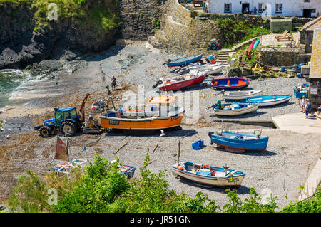 Fishing boats at Cadgwith Cove village, Lizard Peninsula, Cornwall, UK in summer Stock Photo