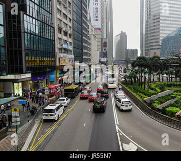 Hong Kong - Mar 30, 2017. Cars run on street at Causeway District in Hong Kong, China. Hong Kong ranks as the world fourth most densely populated sove Stock Photo