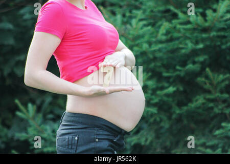 Pregnancy concept. pregnant girl. summer Stock Photo