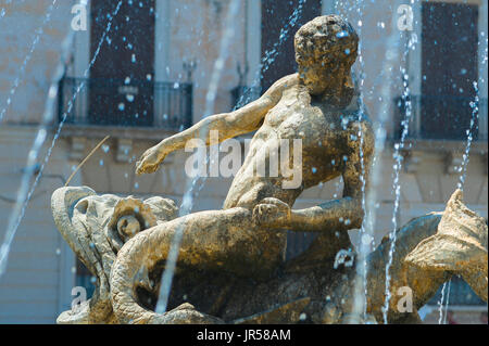 Sicily piazza, detail of a mythological figure in the Artemis Fountain in the Piazza Archimede, Ortigia Island, Syracuse (Siracusa) Sicily.
