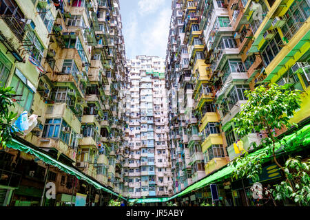 Over-crowded housing in Hong Kong's old residential district of Quarry Bay. With a population of over 7 million, Hong Kong is one of the most densely  Stock Photo