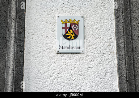 Metal Sign mounted to wall with the German word Standesamt translation register office emblem of the german Region Rhineland Palatino Stock Photo