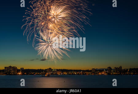 Canada's 150th. anniversary was celebrated by a spectacular fireworks display over Kempenfelt Bay in Barrie, Ontario, Canada on July 1, 2017. Stock Photo