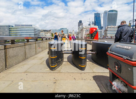 Anti-vehicle barriers erected on the pavement on London Bridge in the Borough area, Southwark, London SE1 as a terrorism prevention measure Stock Photo