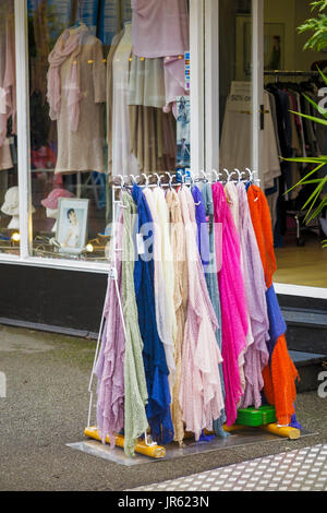 Colourful display of colourful woollen scarves outside a clothes shop in Gabriel's Wharf, Upper Ground, South Bank, Southwark, London SE1 Stock Photo