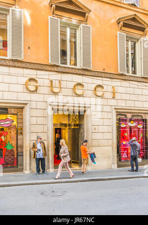 street scene in front of gucci store Stock Photo