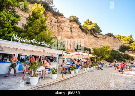 Gargano, Italy, 20 Jul 2017: Vignanotica beach bar, tourists in the famous Gargano beach of vignanotica Stock Photo