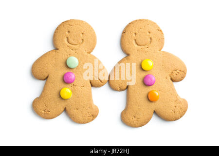 Two sweet gingerbread men isolated on white background. Xmas gingerbread. Stock Photo