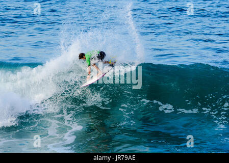 Huntington Beach, USA. 03 August, 2017. Kiron Jabour (USA-Hawaii) competes at the 2017 VANS US Open of Surfing. Credit: Benjamin Ginsberg/Alamy Live News. Stock Photo