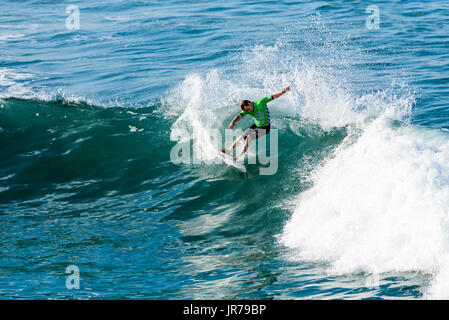 Huntington Beach, USA. 03 August, 2017. Kiron Jabour (USA-Hawaii) competes at the 2017 VANS US Open of Surfing. Credit: Benjamin Ginsberg/Alamy Live News. Stock Photo