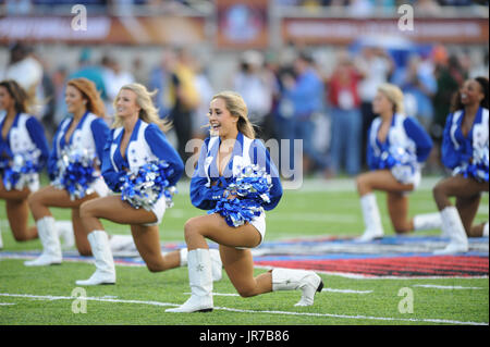 Dallas Cowboys vs. Arizona Cardinals . NFL Game. American Football League  match. Silhouette of professional player celebrate touch down. Screen in  bac Stock Photo - Alamy