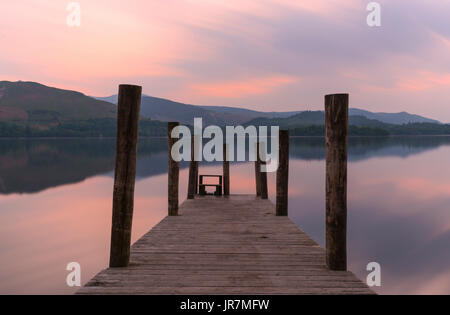 Sundown on Ashness Jetty on Derwent Water in the Lake District Cumbria Stock Photo