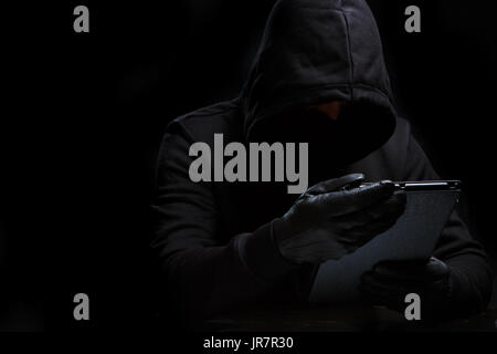 Photo of thief in black Stock Photo