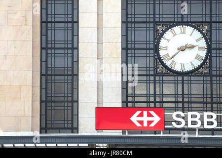 GENEVA, SWITZERLAND - JUNE 19, 2017: Logo of the Swiss railways (SBB CFF FFS) in front of Geneva Cornavin (Gare de Cornavin) train station, in the cen Stock Photo