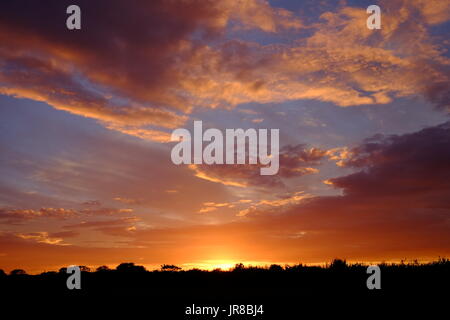 A spectacular August sunset over Chapel St Leonards in Lincolnshire Stock Photo