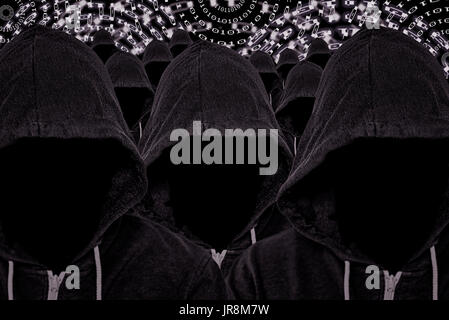 Multitude of hooded unknown mysterious computer criminals with binary code background Stock Photo
