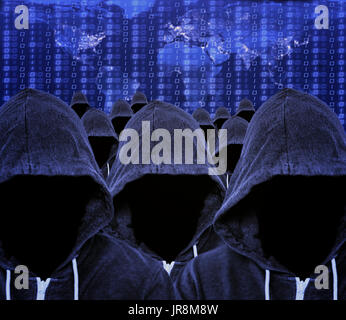 Hooded mass of unknown faceless computer hacker and cyber criminals with a world map of internet usage and binary code Stock Photo