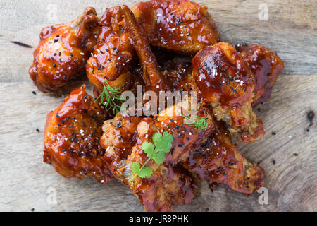 Delicious Home style Korean fried chicken with spicy sauce. Stock Photo