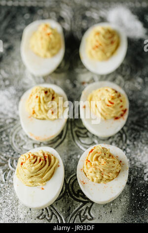 Southern deviled eggs with smoked paprika Stock Photo
