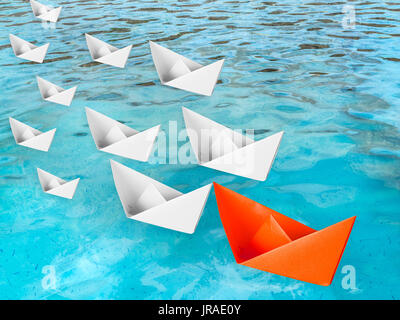 leadership concept with paper boat floating Stock Photo