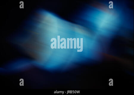 Abstract multicolored diagonal spots blurred background Stock Photo