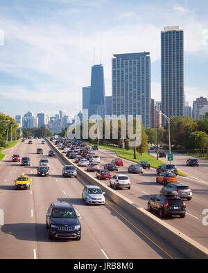 A view of the car traffic on North Lake Shore Drive and the Chicago skyline, including the John Hancock Center.  Chicago. Stock Photo