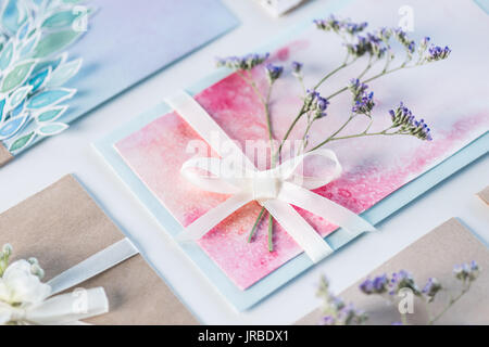collection of envelopes or invitations isolated on white, wedding invitation floral concept Stock Photo