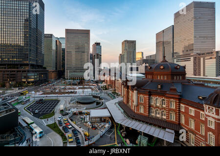 Tokyo railway station and Tokyo highrise building at eveing time in Tokyo, Japan. Stock Photo