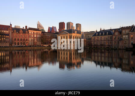 Historic architecture of the Hague, seat of government, like government building and Mauritshuis museum reflection in The Hague, The Netherlands. Stock Photo