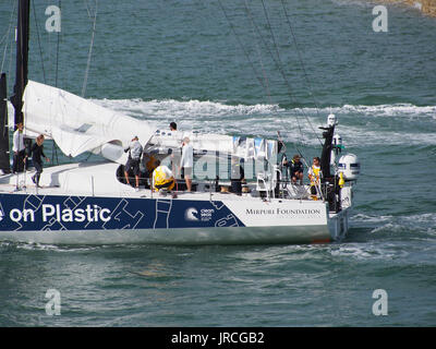 The yacht of team 'Turn the tide on Plastic' preparing for the Volvo ocean race in Portsmouth Harbour Stock Photo