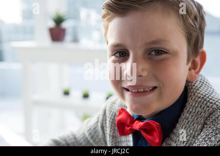 Close up portrait of smiling businessman in office Stock Photo