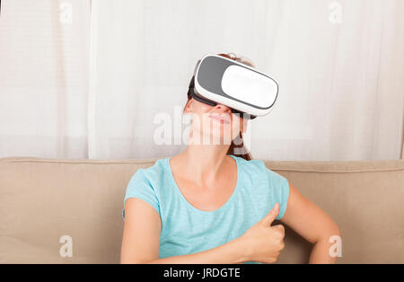 Beautiful women using VR glasses. Virtual reality. Stock Photo