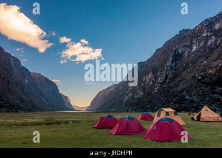 Multiple camping tents set up near Lake Llanganuco Orconcocha of the Cordillera Blanca in Huascaran National Park, Peru Stock Photo