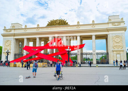MOSCOW, RUSSIA - MAY 11, 2015: Installation with red star next to the colonnade of the main entrance to the Gorky Park, on May 11 in Moscow, Russia Stock Photo