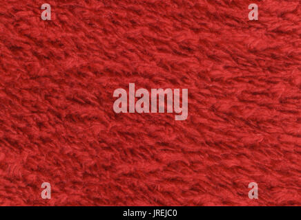 Red double sided terry towelling fabric texture background. High resolution Stock Photo