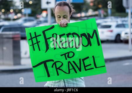 New York City, New York, USA. 4th Aug, 2017. A pro-Cuba group called the Venceremos Brigade organized a demonstration at JFK's Termina 4 to protest an upcoming regression in Cuba-US relatons under the Trump Administration. Despite the claims of a travel ''ban'' to Cuba, there remain more than a dozen legal ways to visit Cuba as an American, including using an officially licensed tour operator or for family travel. Activists, however, continue to use and sensationalize the word ''ban''. Furthermore, the enforcement of the travel restrictions are expected to take months Stock Photo