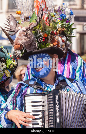 Sidmouth, 5th Aug 17. Morris Men perform beside the sandstone cliffs at Sidmouth during the Folk Week Festival. The folk festival has been running since 1955, attracts tens of thousands of visitors, and will see over 700 events before the final concert on the 11th August.Credit: South West Photos / Alamy Live News Stock Photo