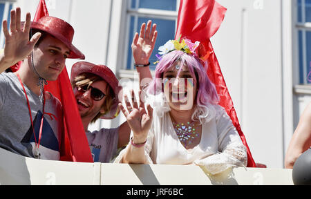 Brighton, UK. 5th Aug, 2017. Thousands take part in the Brighton and Hove Pride Community Parade through the city on a beautiful warm sunny day . Over 300000 visitors are expected to attend and celebrate the Summer Of Love and Carnival of Diversity in Britains largest LGBT event over the weekend Credit: Simon Dack/Alamy Live News Stock Photo