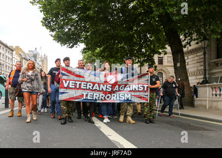 London, UK. 5th Aug, 2017. Veterans Against Terrorism group take a petition to Downing Street asking the British government to take firmer action against the 3,000 suspected Muslim extremists living in Britain. The group marched from Parliament Square to outside Downing Street.. Penelope Barritt/Alamy Live News Stock Photo