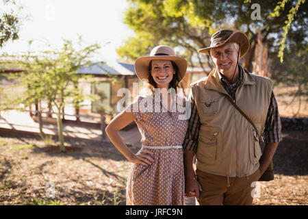 Senior couple standing at the resort Stock Photo