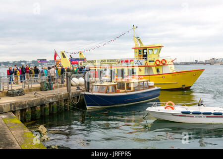 The quay where ferries from Sandbanks and Poole land their passengers on Brownsea Island in Poole Harbour, Dorset, England, UK Stock Photo