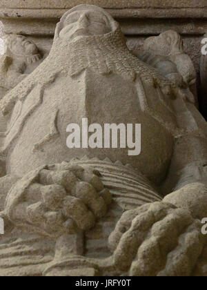 A close view of a stone low relief of a dead knight with his armour Stock Photo