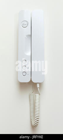 Phone observation system on white wall. Stock Photo