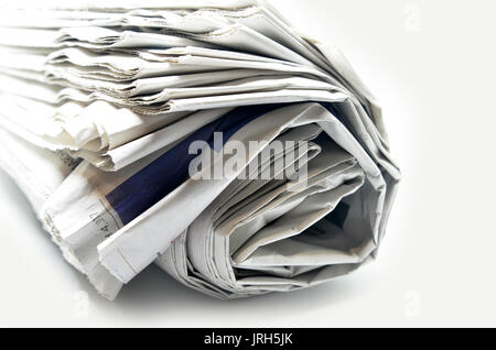 Roll of newspapers, isolated on white background Stock Photo