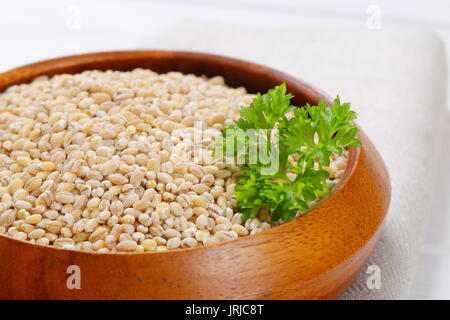 bowl of pearl barley - close up Stock Photo