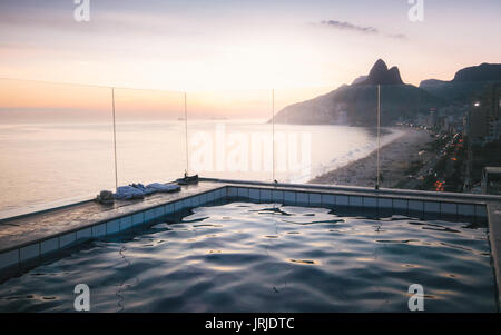 Infinity penthouse pool overlooking Ipanema Beach in Rio de Janeiro, Brazil Stock Photo