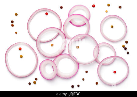 Sliced red onion with peppercorn isolated on white background. Top view Stock Photo