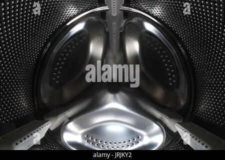 Inside the drum of a washing machine Stock Photo