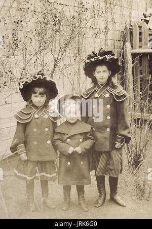 Children in the latest fashion. Vintage photo, Russia, 1905 Stock Photo