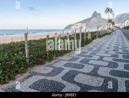 Swirling patterns on the sidewalk of Ipanema beach in Rio de Janeiro, Brazil Stock Photo